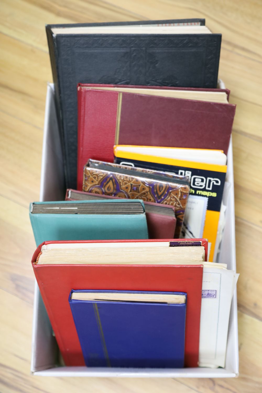 Seven stock books and two albums of world stamps